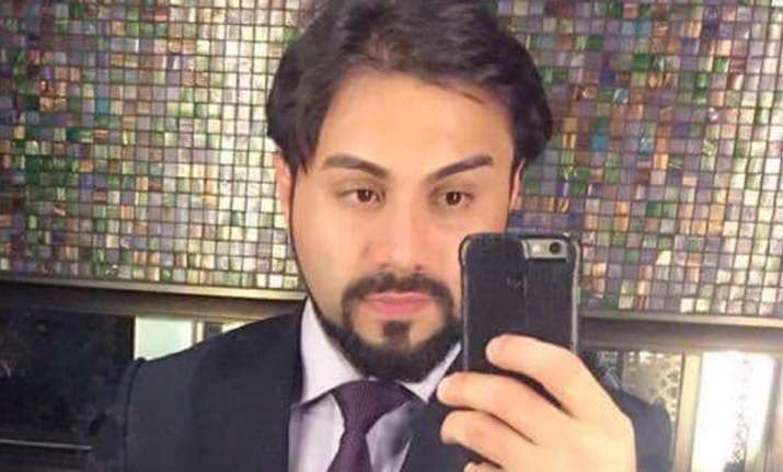 Afghan held for raping US woman
