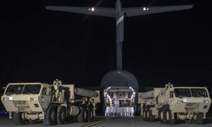 Trucks carrying missile launchers and other equipment
