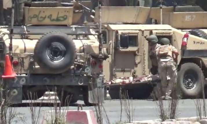 Gunmen storm state broadcaster's compound in eastern