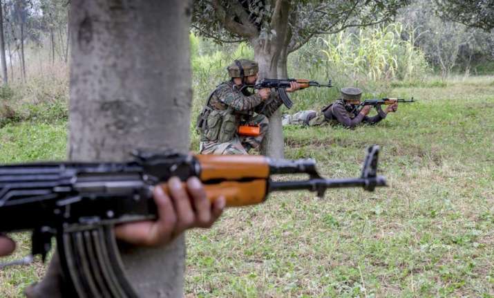 Militant surrenders during encounter in Shopian