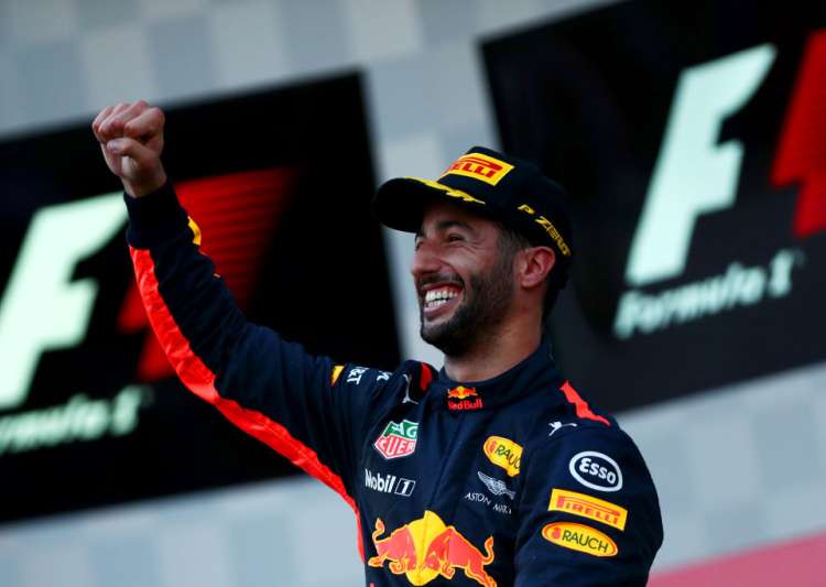 http://resize.indiatvnews.com/en/centered/newbucket/750_533/2017/06/daniel-ricciardo-of-australia-celebrates-on-the-podium-after-winning-the-azerbaijan-formula-one-grand-prix-1498408213.jpg