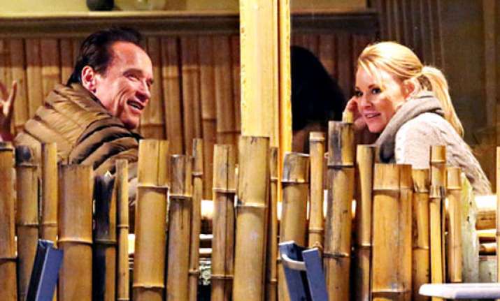 arnold schwarzenegger spotted kissing new girlfriend