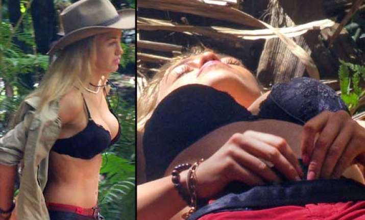 i m a celebrity... star amy willerton strips down to bra
