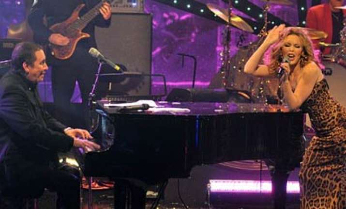 in skintight leopard print kylie ushers in 2011 on bbc with