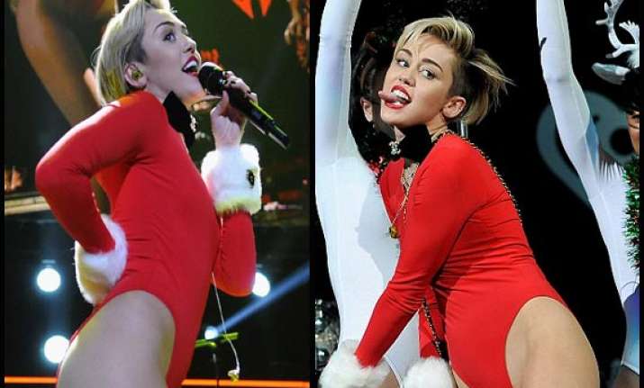 miley cyrus strips twerks again at the jingle ball view pics