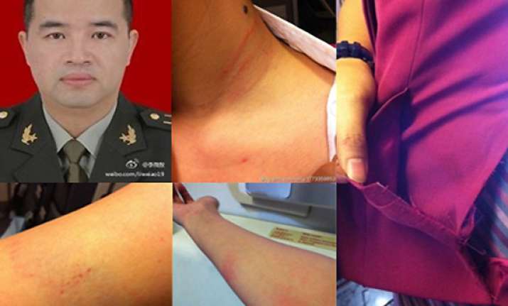 chinese official suspended for beating air stewardess