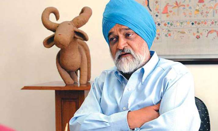 aadhar is a number not an id card says montek singh