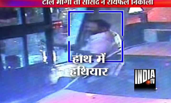 for rs 50 toll congress mp radadiya brandishes rifle at