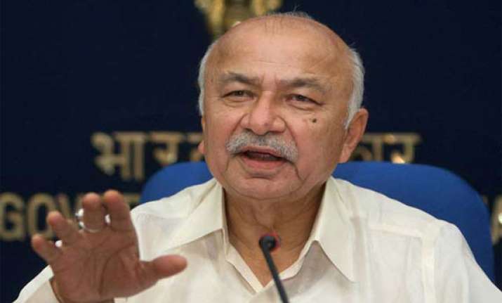 congress clarifies shinde s hindu terror remark bjp seeks