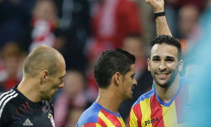 bayern beats valencia 2 1 in champions league