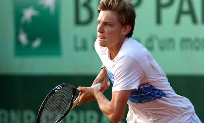 isner ousted by goffin at valencia open