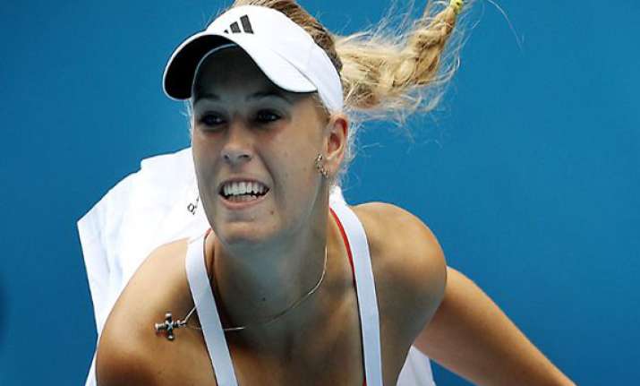 wozniacki advances bartoli upset at kremlin cup