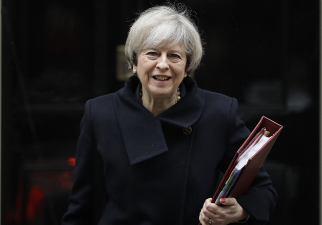May leaves 10 Downing Street in London to attend PM's