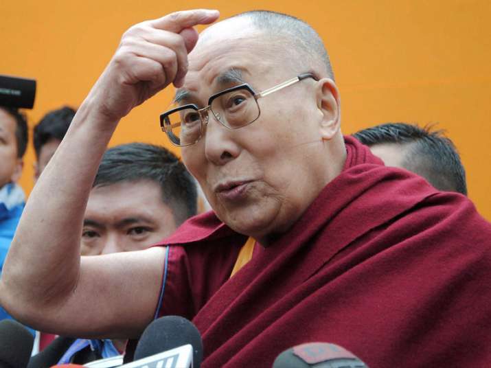 Dalai Lama interacting with media after a spiritual