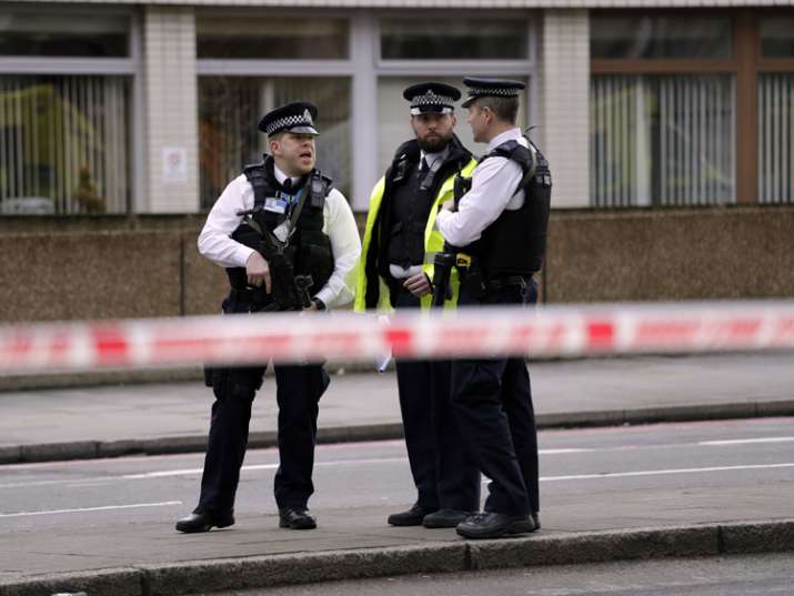 Police secure area close to the Parliament in London after