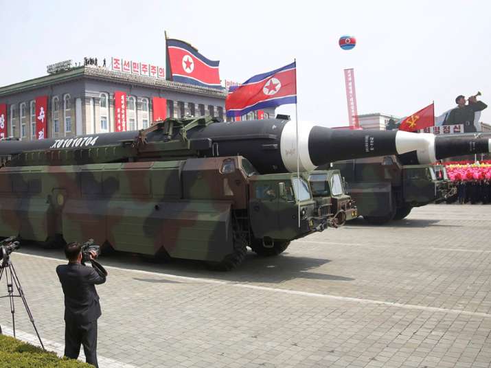 North Korea flaunts long-range missiles in massive parade