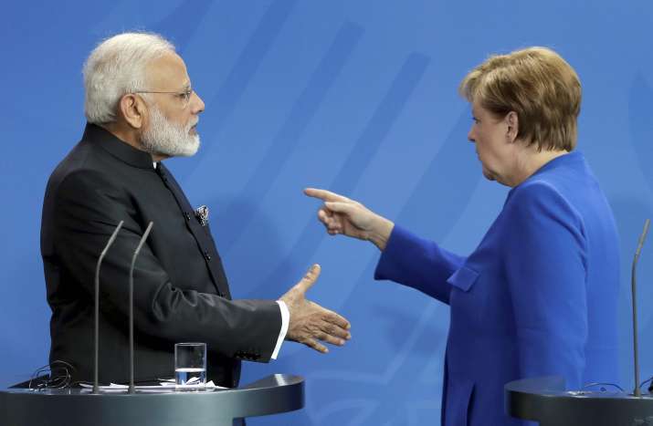 PM Modi backs Merkel’s leadership as Trump criticises