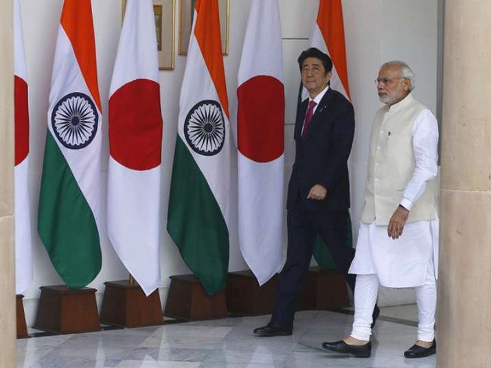 File pic of Japan PM Abe with his Indian counterpart