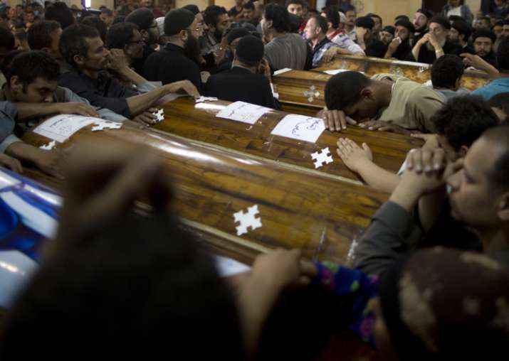 Relatives of Coptic Christians who were killed during a bus