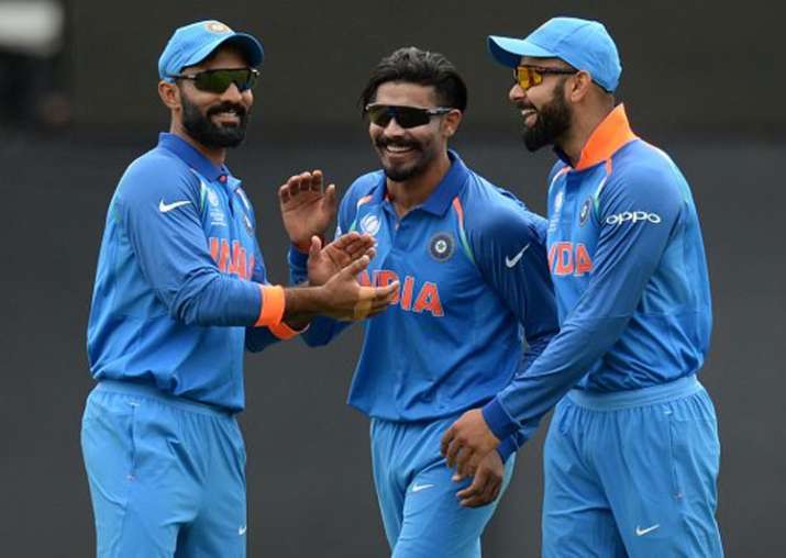 Dinesh karthik, Ravindra Jadeja and Virat Kohli in action.