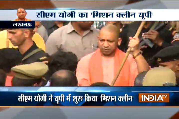 Yogi Adityanath wielding broom