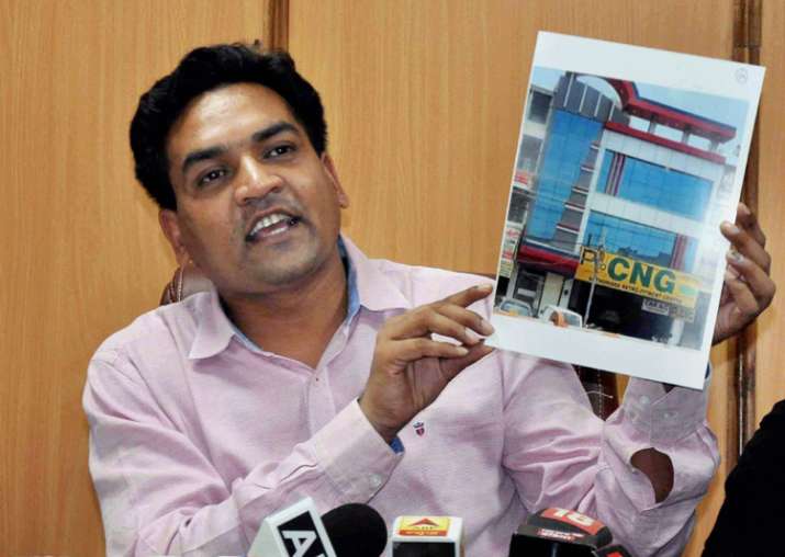 Sacked Delhi minister Kapil Mishra addresses a press