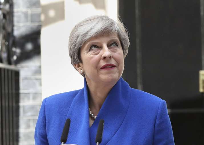 Theresa May speaks to the media outside 10 Downing Street