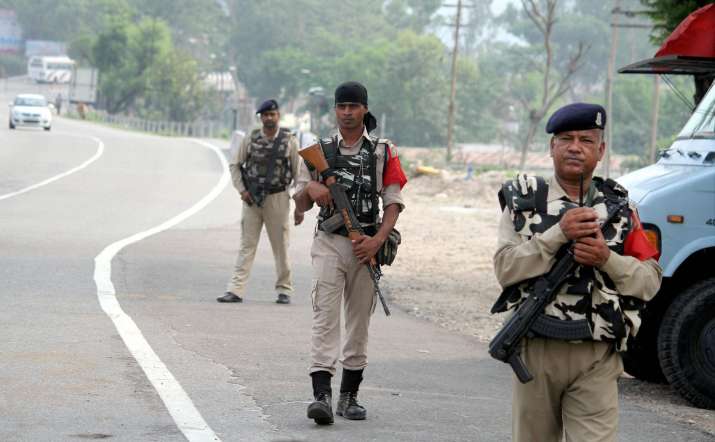 CRPF personnel patrol on Jammu-Srinagar highway on the eve