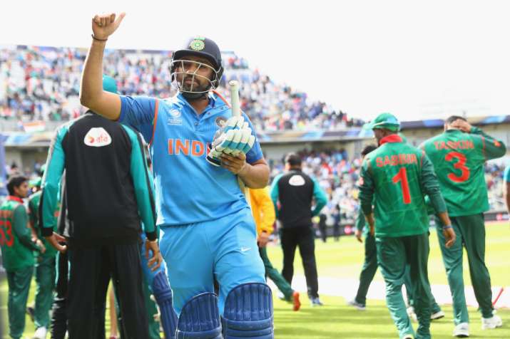 Rohit Sharma of India celebrates his match winning