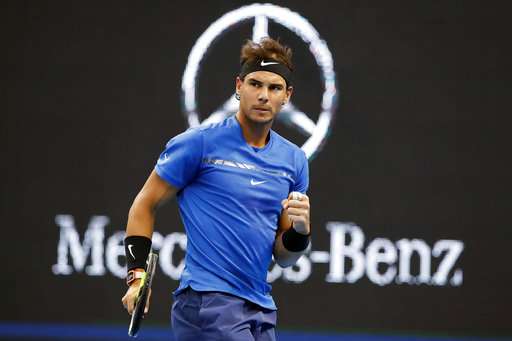 Nadal escapes two match points to beat Pouille