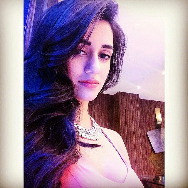 India Tv - Disha Patani likes to keep a pink or nude lip gloss in her beauty bag India Tv - Disha Patani likes to keep a pink or nude lip gloss in her beauty bag