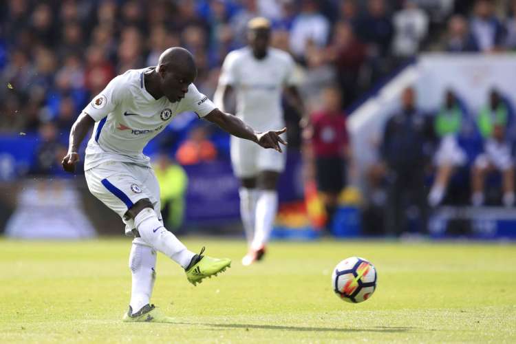 Chelsea's Kante shoots on target against Leicester