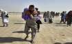 Stranded people gather and wait to open the border which