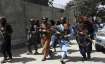 Taliban fighters patrol in Wazir Akbar Khan neighborhood in