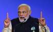Prime Minister Narendra Modi gestures as he makes a