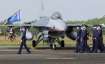 Taiwanese Air Force personnel pass by one of the newly