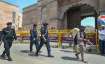 Security personnel guard outside the Gyanvapi mosque after