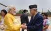 Prime Minister Narendra Modi is greeted by Nepal PM Sher
