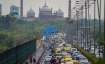 New Delhi: Vehicles move slowly during a traffic jam