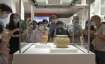 Visitors tour the Hong Kong Palace Museum during the first