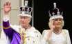Britain's King Charles III and Queen Camilla wave 