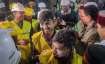 Workers expressed their happiness after being rescued