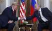 Russia's President Vladimir Putin shakes hands with then-US President Donald Trump during a meeting 