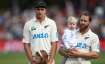 Tim Southee and Kane Williamson line up for New Zealand's national anthem.