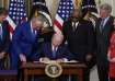US President Joe Biden, joe biden signs massive climate health care legislation, latest updates, uni