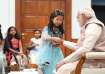 Raksha Bandhan 2022, PM Modi celebrates Raksha Bandhan with daughters of PMO staff, pm modi image, p