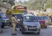 Assam Police personnel stop Meghalaya-bound vehicles for