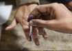 Polling in Gujarat is conducted in two phases - one on Dec