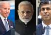 US President Joe Biden (L), Indian PM Narendra Modi (C) and