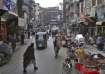 People visit a market in the old area of Peshawar, Pakistan.